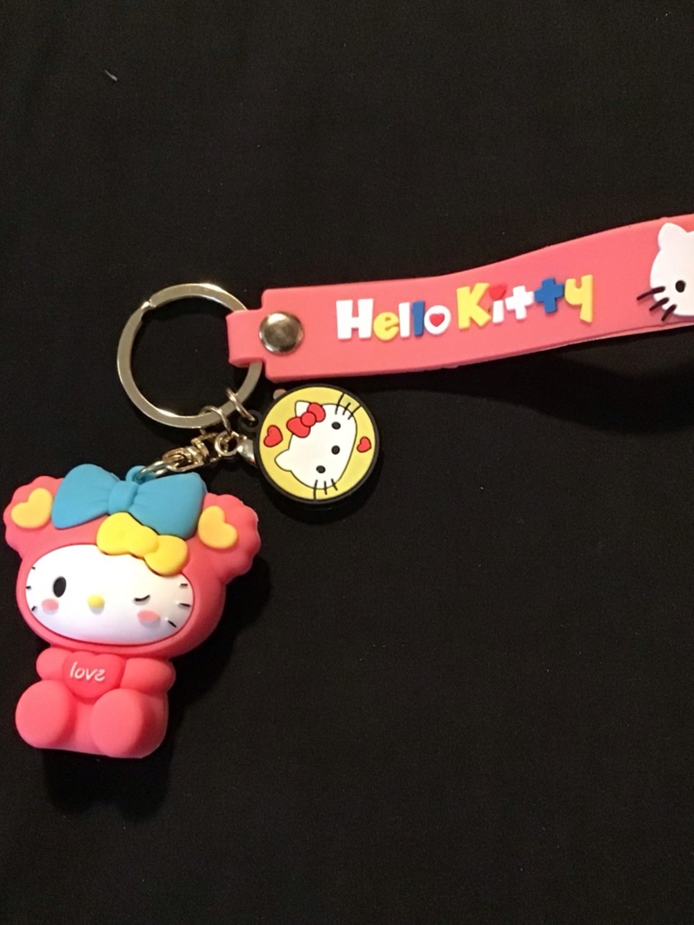 Hello Kitty Pink Silicone Strap Keychain with Blue and Yellow Bow Charm